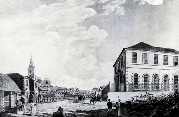 This water-colour drawing by Thomas Hearne, dated approximately 1772, shows the back of the Courthouse on the right, the Police Station yard on the left, and a military parade along the fence, before the bayonets were in place.