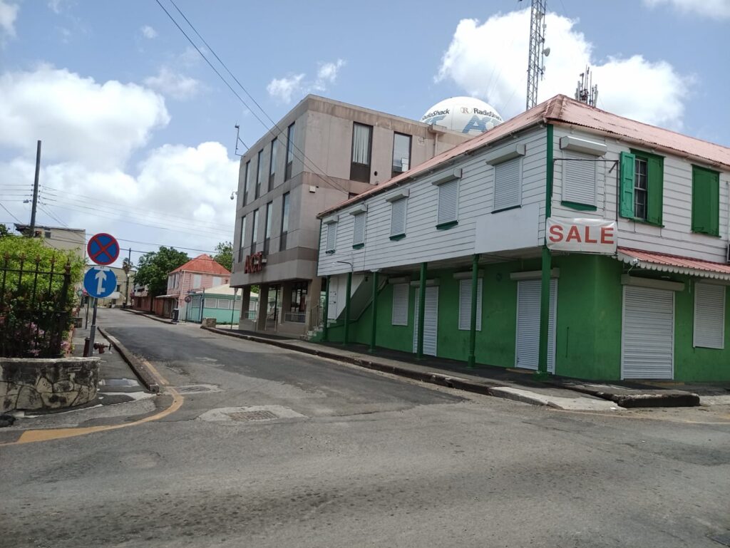 The Delos J. Martin store was replaced by the ACT building, as shown in the photo.