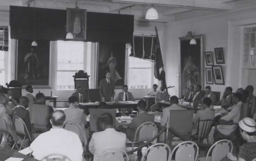 The photo shows a meeting of the Legislative Council in 1961.